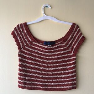 Orange and white striped knit top